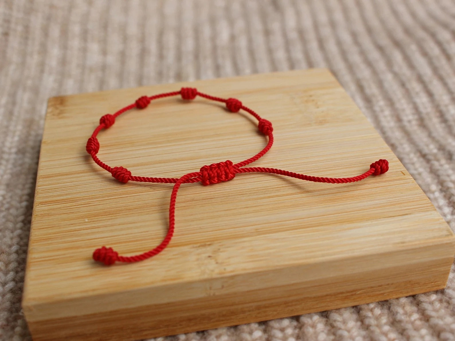 Unraveling the Bracelet Labyrinth: 7-Knot Red String Bracelet (Part 2)